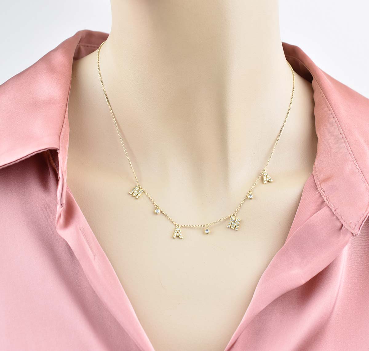 Χρυσό κολιε Κ9 με μονογράματα και ζιργκόν